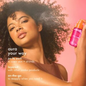 Model applying amika Aura Hair + Body Mist to hair and skin